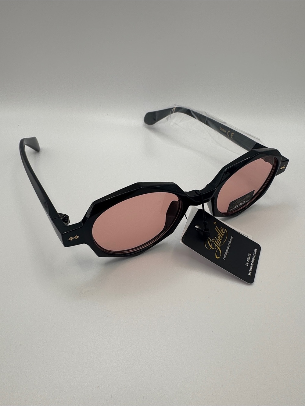 Black Frame Sunglasses with Pink Lenses -